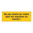 Ne pas mettre les mains dans les machines en marche !
