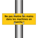 Ne pas mettre les mains dans les machines en marche !