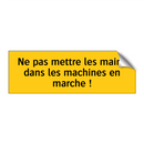 Ne pas mettre les mains dans les machines en marche !