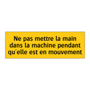 Ne pas mettre la main dans la machine pendant qu'elle est en mouvement