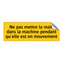 Ne pas mettre la main dans la machine pendant qu'elle est en mouvement
