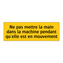 Ne pas mettre la main dans la machine pendant qu'elle est en mouvement