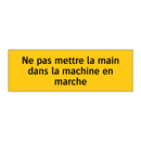 Ne pas mettre la main dans la machine en marche
