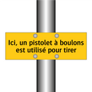 Ici, un pistolet à boulons est utilisé pour tirer