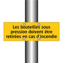 Les bouteilles sous pression doivent être retirées en cas d'incendie