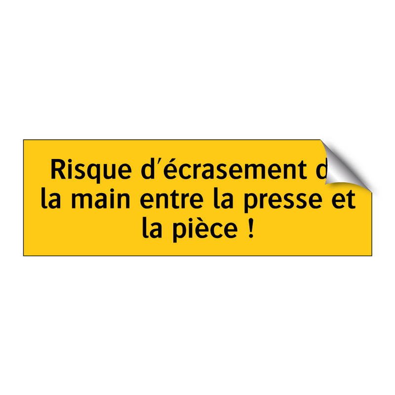 Risque d'écrasement de la main entre la presse et la pièce !