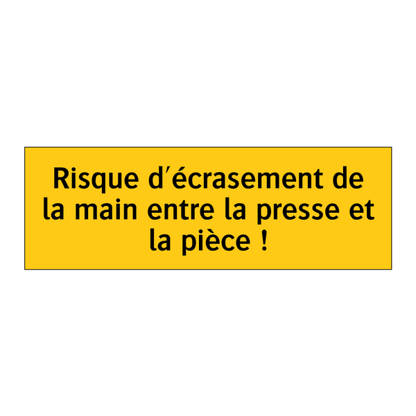Risque d'écrasement de la main entre la presse et la pièce !