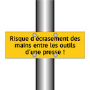 Risque d'écrasement des mains entre les outils d'une presse !