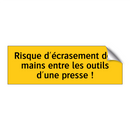 Risque d'écrasement des mains entre les outils d'une presse !