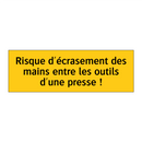 Risque d'écrasement des mains entre les outils d'une presse !