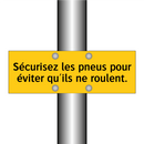 Sécurisez les pneus pour éviter qu'ils ne roulent