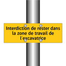 Interdiction de rester dans la zone de travail de l'excavatrice
