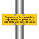 Éloignez-vous de la paroi de la cage. Fermez les portes de la cage après avoir quitté la cabine