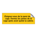Éloignez-vous de la paroi de la cage. Fermez les portes de la cage après avoir quitté la cabine