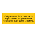 Éloignez-vous de la paroi de la cage. Fermez les portes de la cage après avoir quitté la cabine
