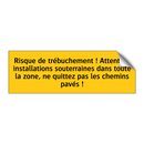 Risque de trébuchement ! Attention installations souterraines dans toute la zone, ne quittez pas les chemins pavés !