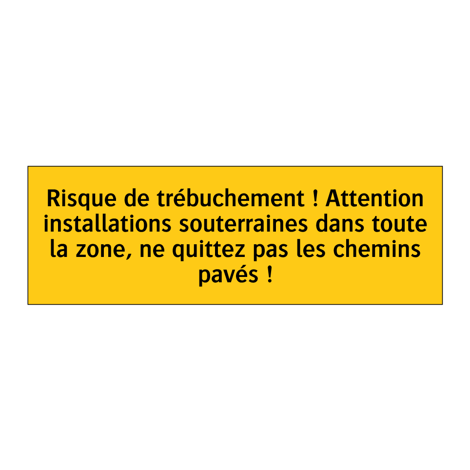 Risque de trébuchement ! Attention installations souterraines dans toute la zone, ne quittez pas les chemins pavés !