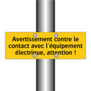 Avertissement contre le contact avec l'équipement électrique, attention !