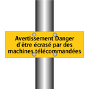 Avertissement Danger d'être écrasé par des machines télécommandées