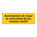 Avertissement de risque de coincement dû aux rouleaux rotatifs