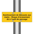 Avertissement de blessures aux mains - Risque d'écrasement dû à l'outil de pressage