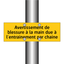 Avertissement de blessure à la main due à l'entraînement par chaîne