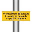 Avertissement de blessure à la main en raison du risque d'écrasement