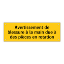 Avertissement de blessure à la main due à des pièces en rotation