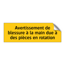 Avertissement de blessure à la main due à des pièces en rotation
