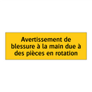Avertissement de blessure à la main due à des pièces en rotation