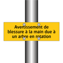 Avertissement de blessure à la main due à un arbre en rotation