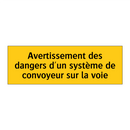 Avertissement des dangers d'un système de convoyeur sur la voie