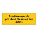 Avertissement de possibles blessures aux mains