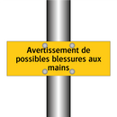 Avertissement de possibles blessures aux mains