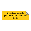 Avertissement de possibles blessures aux mains