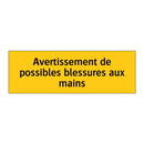 Avertissement de possibles blessures aux mains