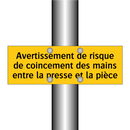 Avertissement de risque de coincement des mains entre la presse et la pièce