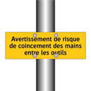Avertissement de risque de coincement des mains entre les outils