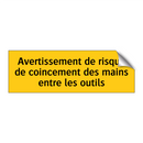 Avertissement de risque de coincement des mains entre les outils