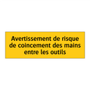 Avertissement de risque de coincement des mains entre les outils