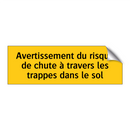 Avertissement du risque de chute à travers les trappes dans le sol