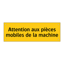 Attention aux pièces mobiles de la machine