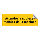Attention aux pièces mobiles de la machine