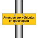 Attention aux véhicules en mouvement