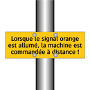 Lorsque le signal orange est allumé, la machine est commandée à distance !