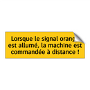 Lorsque le signal orange est allumé, la machine est commandée à distance !
