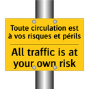 Toute circulation est à vos risques  /.../ - All traffic is at your own risk /.../