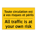 Toute circulation est à vos risques  /.../ - All traffic is at your own risk /.../