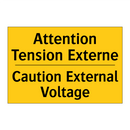Attention Tension Externe - Caution External Voltage