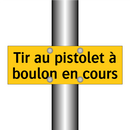 Tir au pistolet à boulon en cours